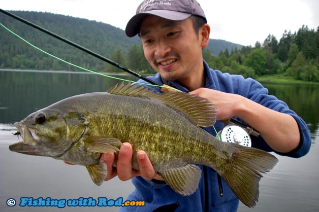 This smallmouth bass is not huge, but its best features are brought out by holding it out